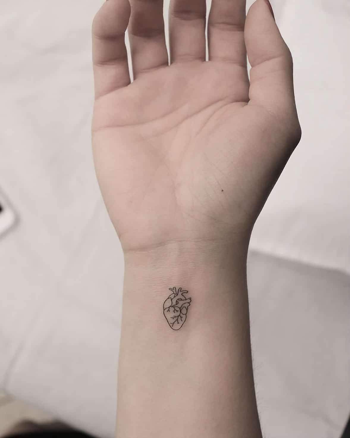 Tatuaje mini de corazón
